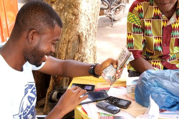 Why Accra businesses still prefer cash payments