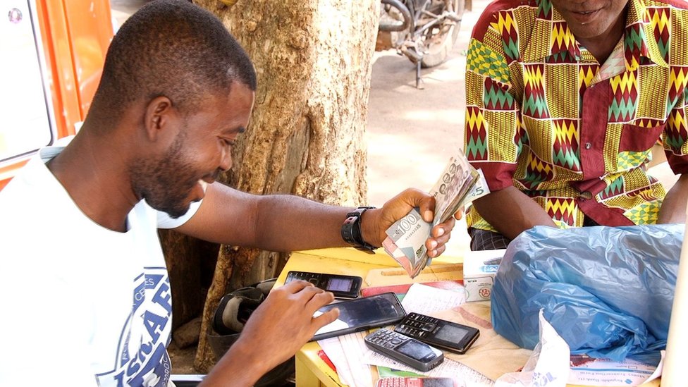 Why Accra businesses still prefer cash payments