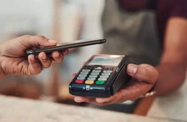 Accra Street Journal's ground-level analysis. From the NFC card tap to the mobile money QR scan and the rise of digital pre-ordering, how Ghanaian shopping is becoming faster and more seamless