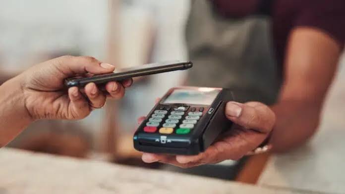 Accra Street Journal's ground-level analysis. From the NFC card tap to the mobile money QR scan and the rise of digital pre-ordering, how Ghanaian shopping is becoming faster and more seamless